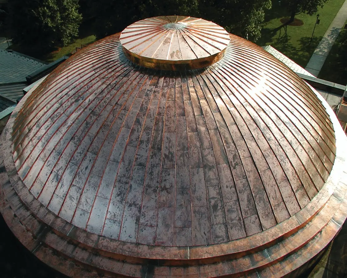 Craftsman Roofing crew installing a new roof in Morrisville